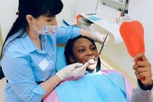 Woman Having Dental Checkup - dentist asheville
